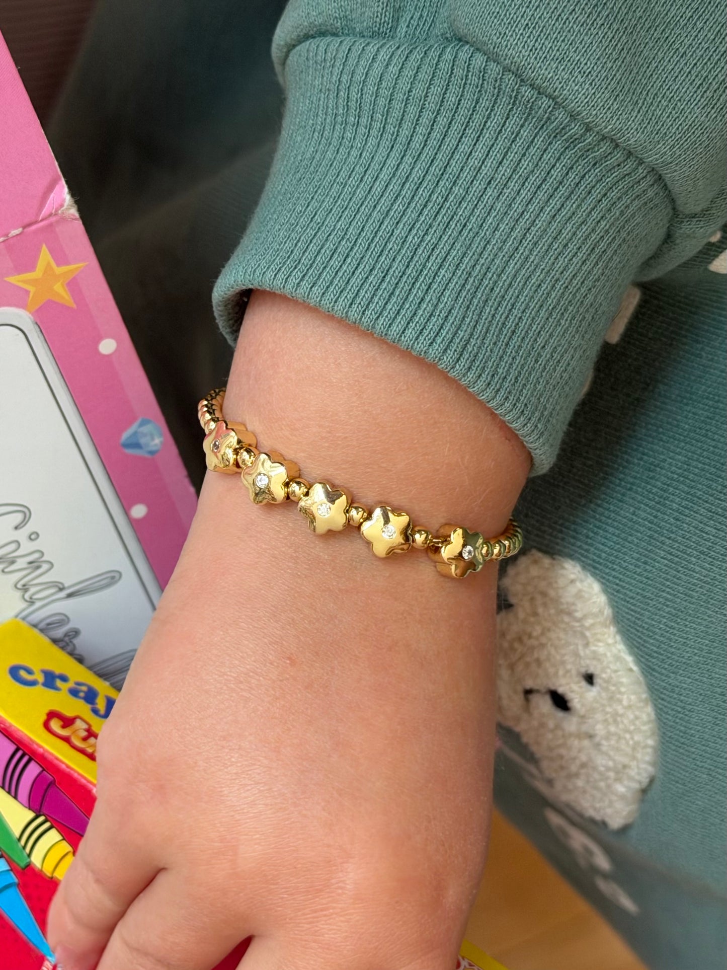 Pulsera de bolitas con flores