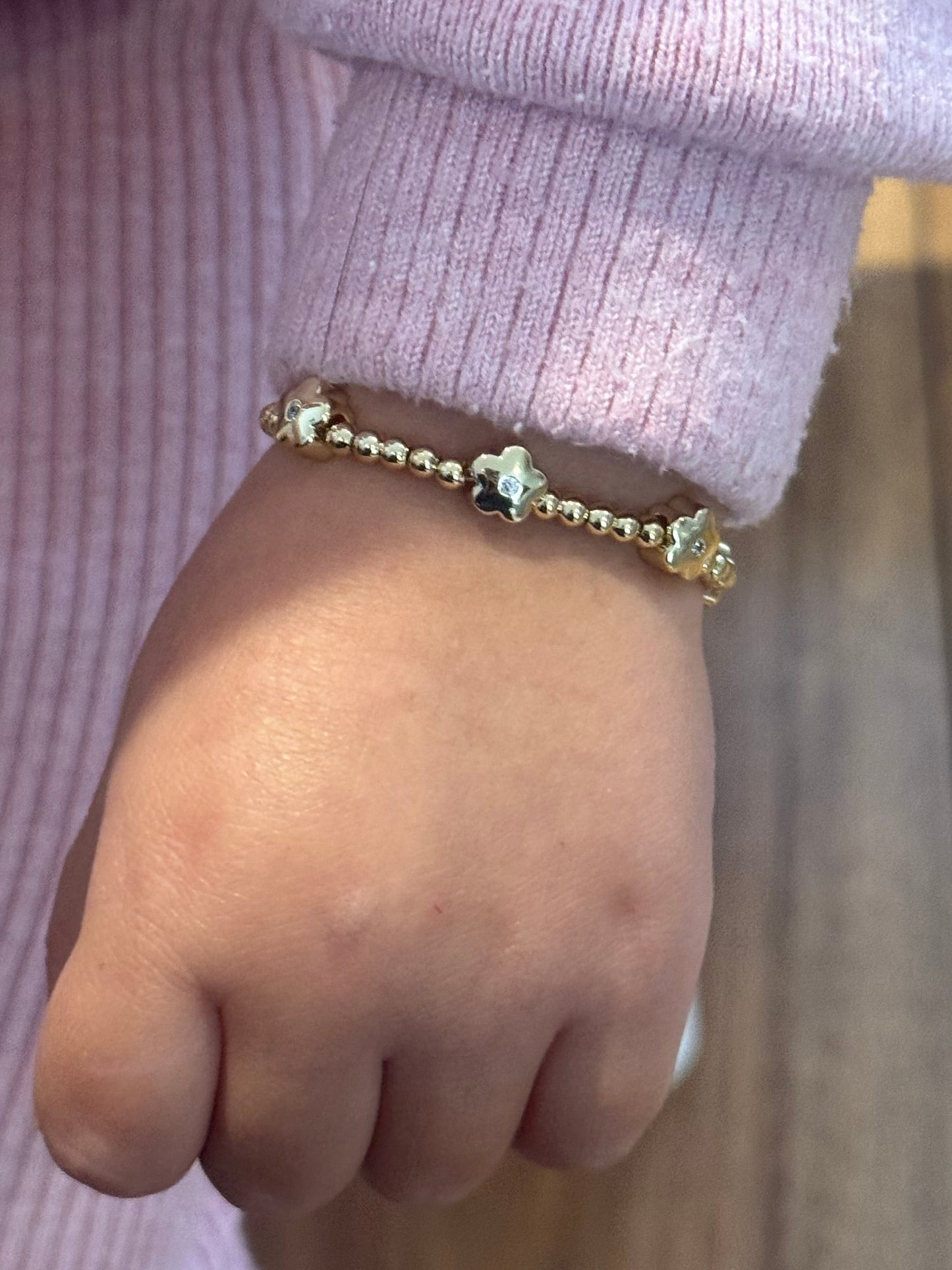 Pulsera bolitas y flores