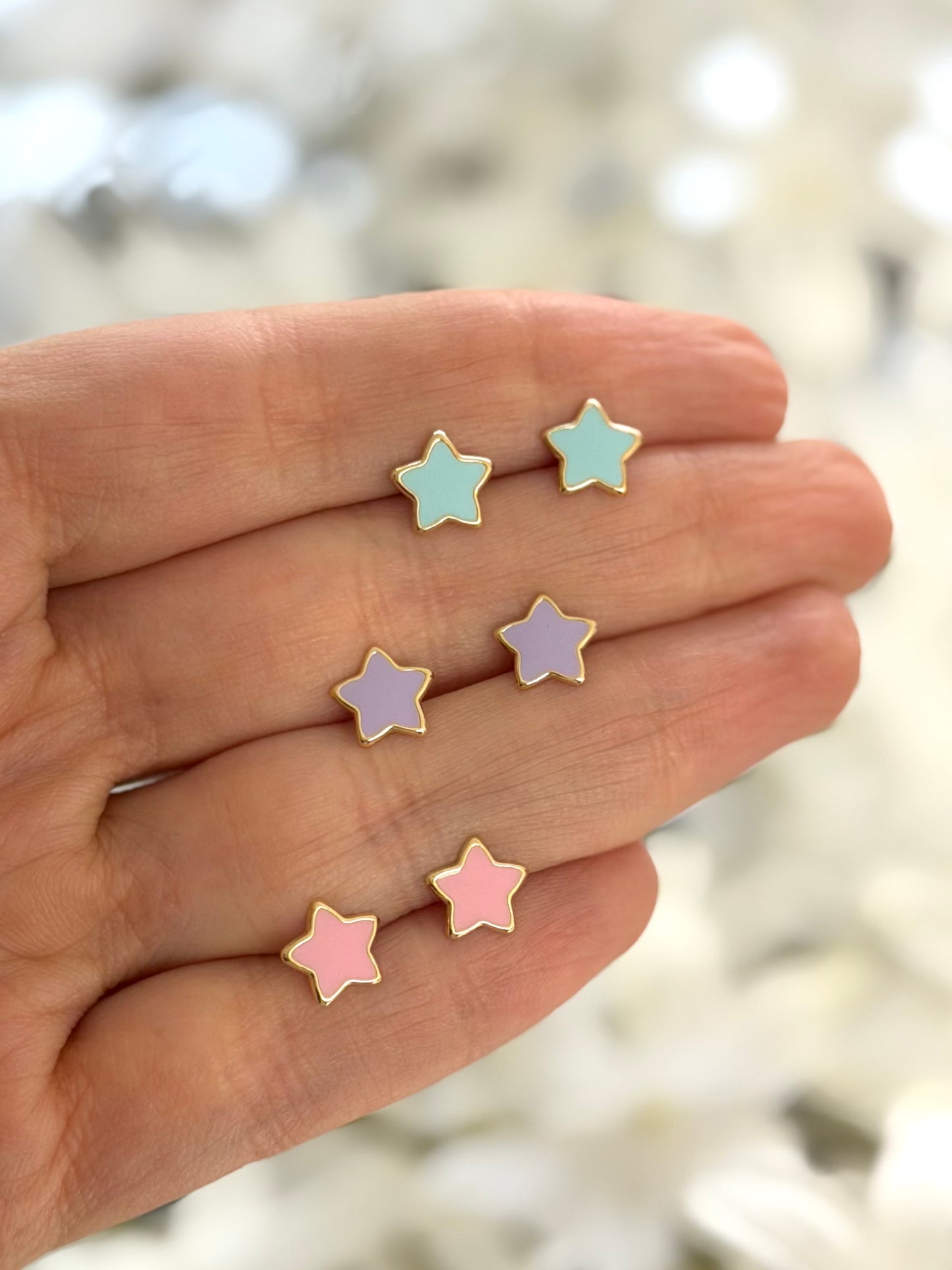 Aretes estrella morada