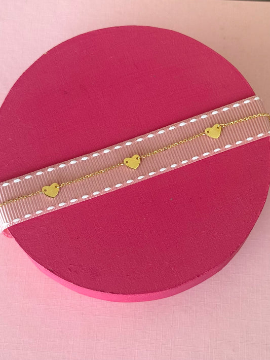Pulsera corazones de oro