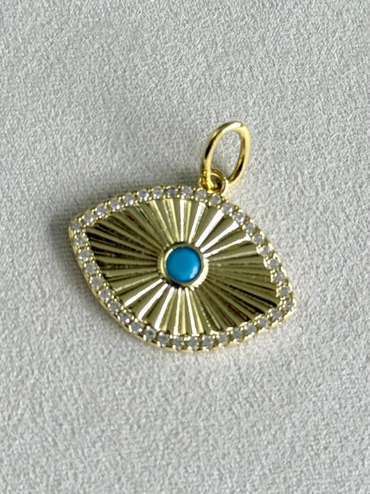 Charm ojo centro turquesa