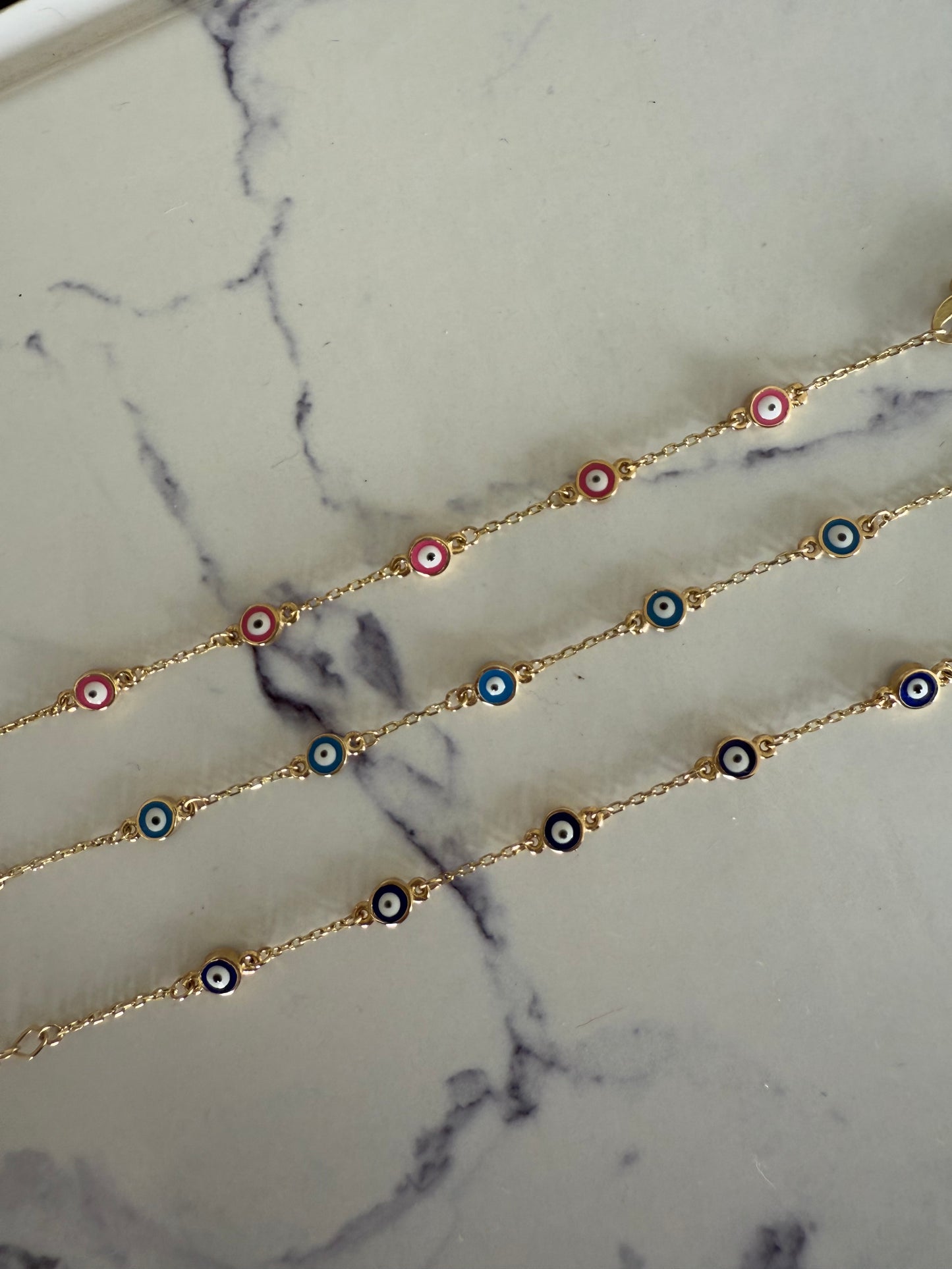 Pulsera ojitos mini azul