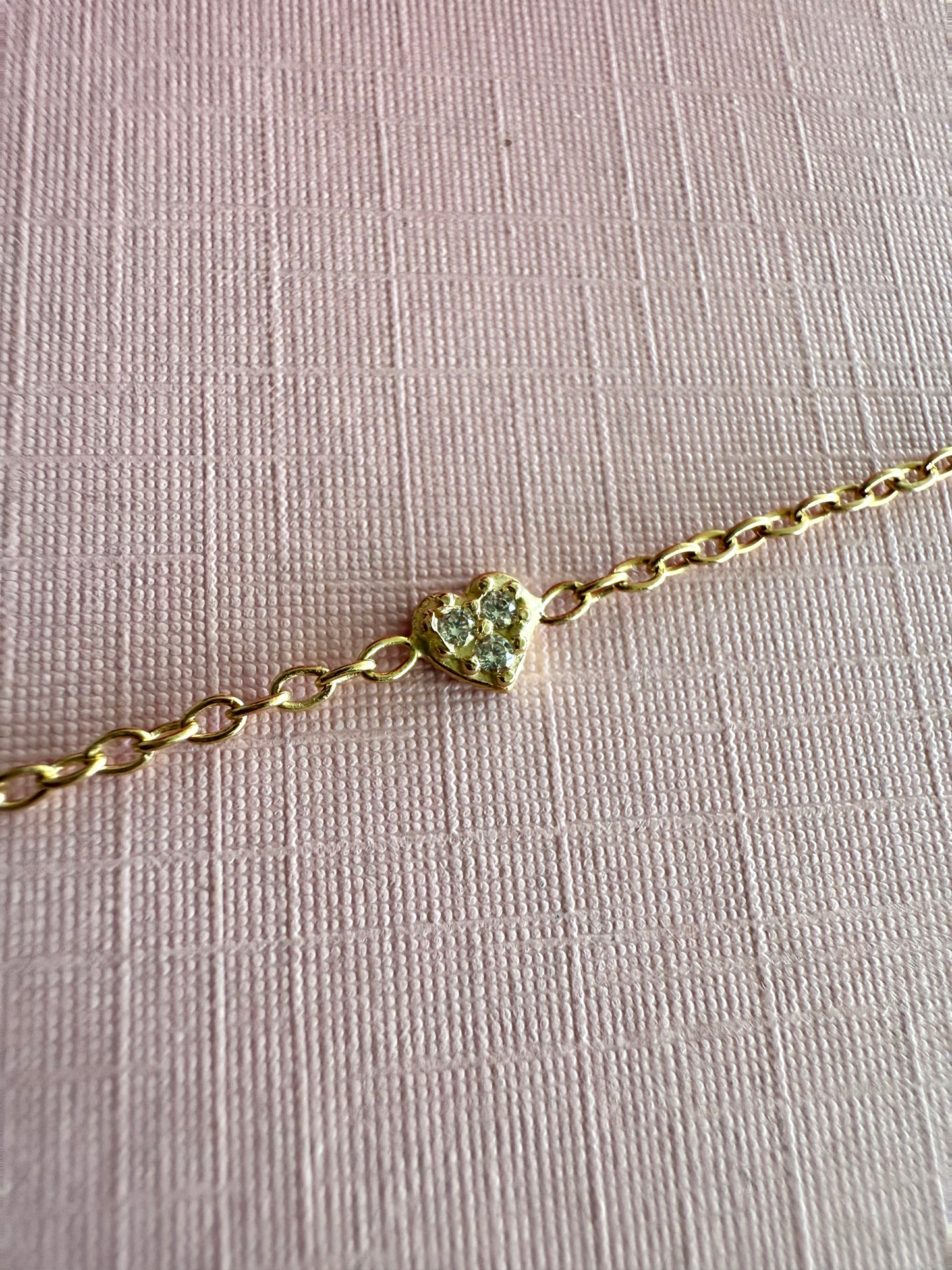 Pulsera corazones mini oro y cz