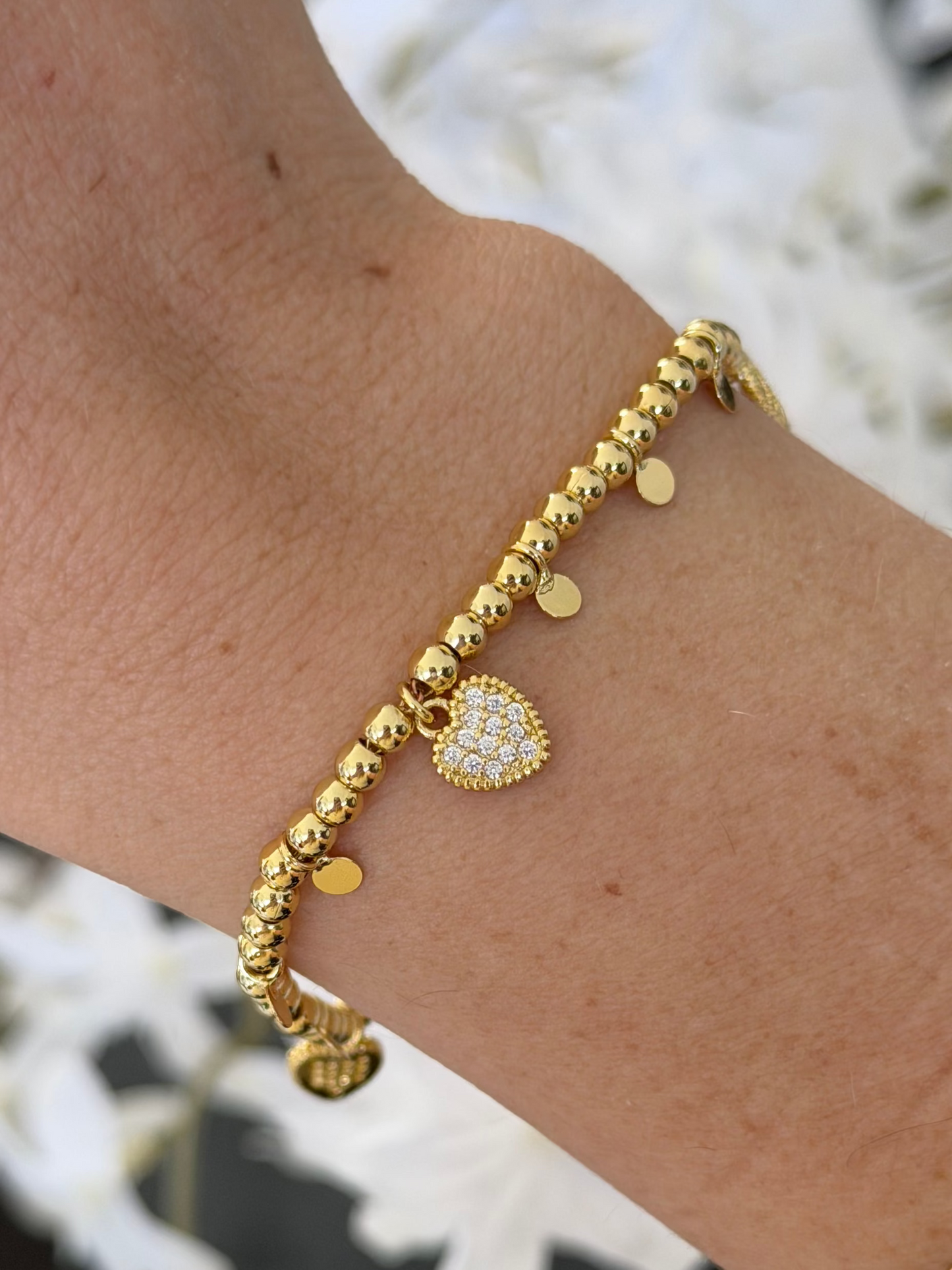 Pulsera bolitas y corazones