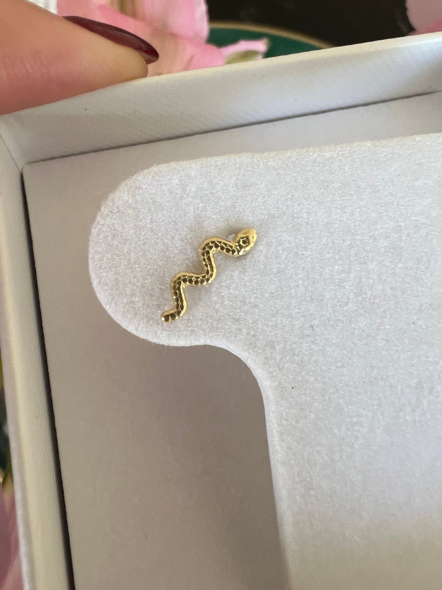 piercing single serpiente