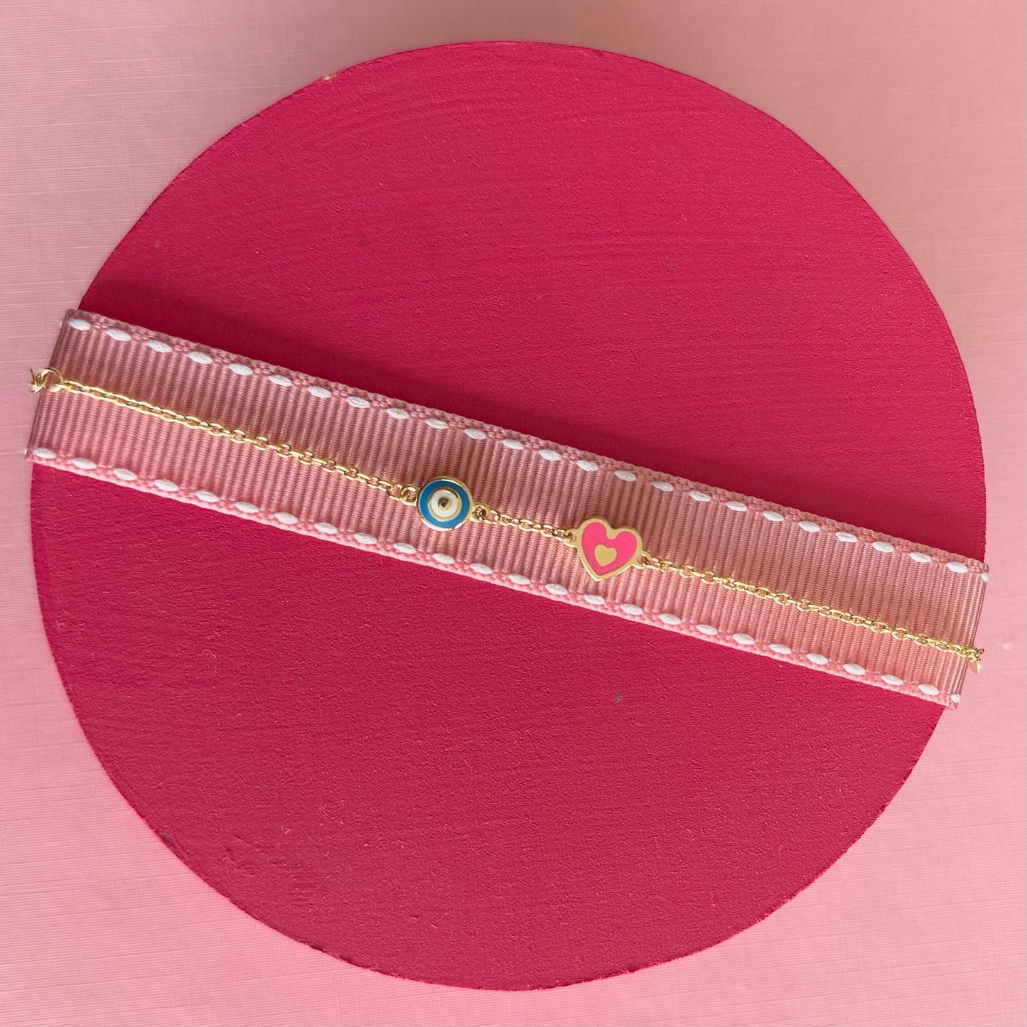 Pulsera ojo corazón rosa