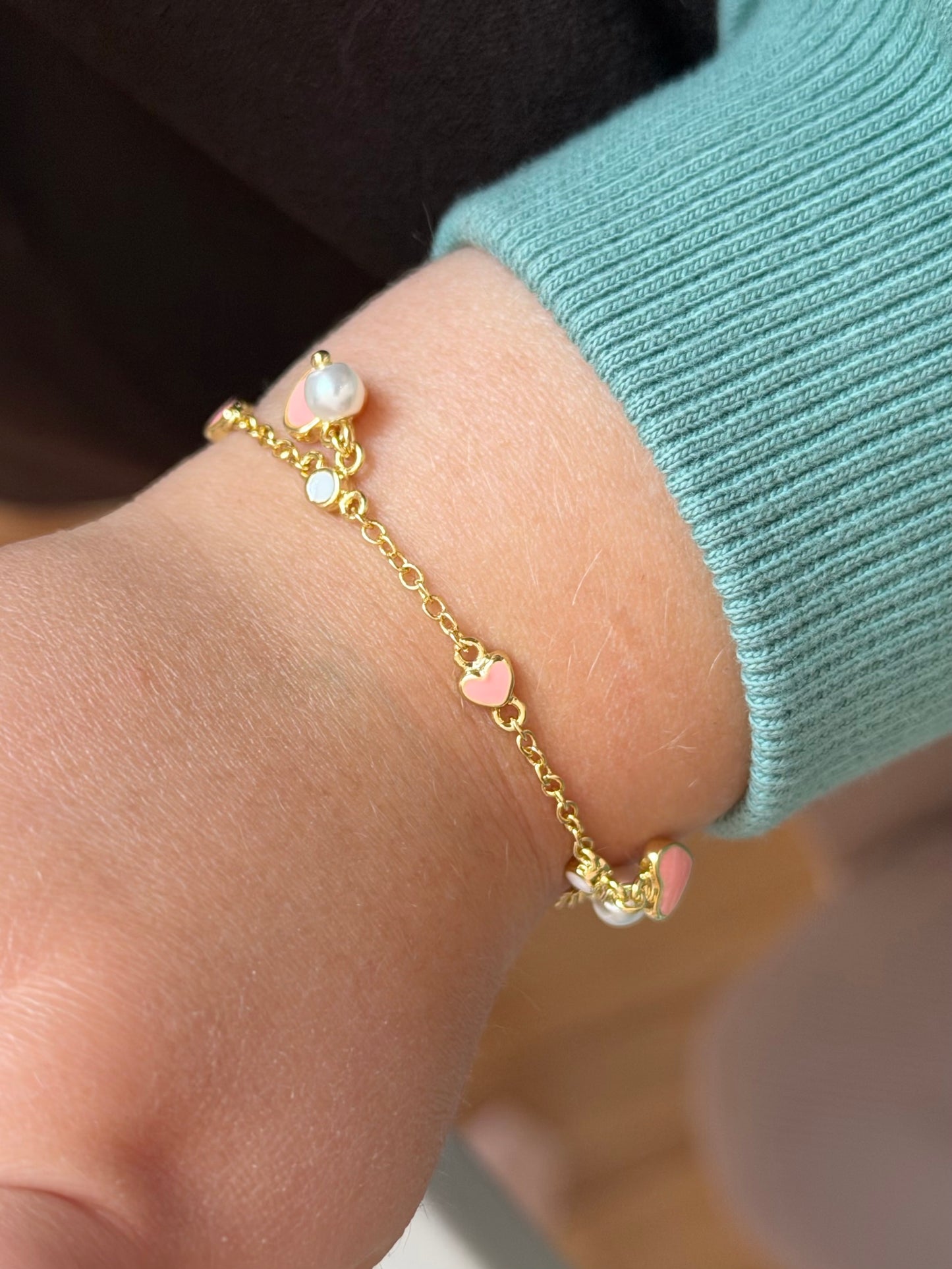 Pulsera corazones y perla colgante