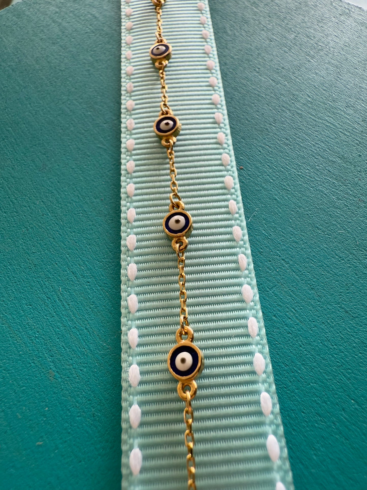 Pulsera ojitos mini azul
