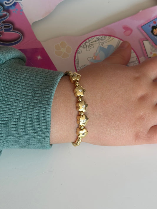 Pulsera de bolitas con flores