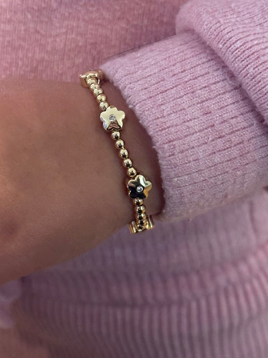 Pulsera bolitas y flores