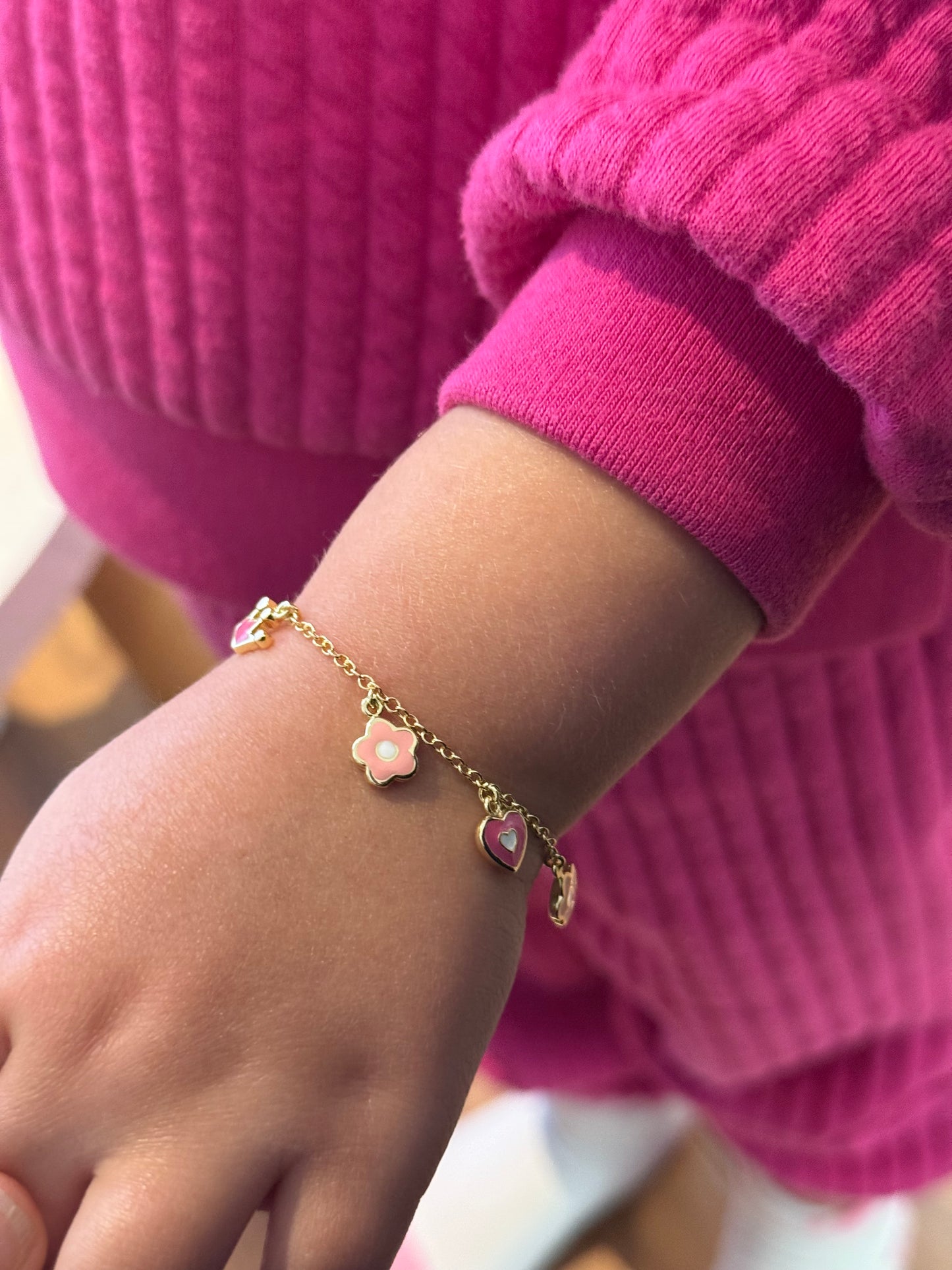 Pulsera corazón, flores y coronas