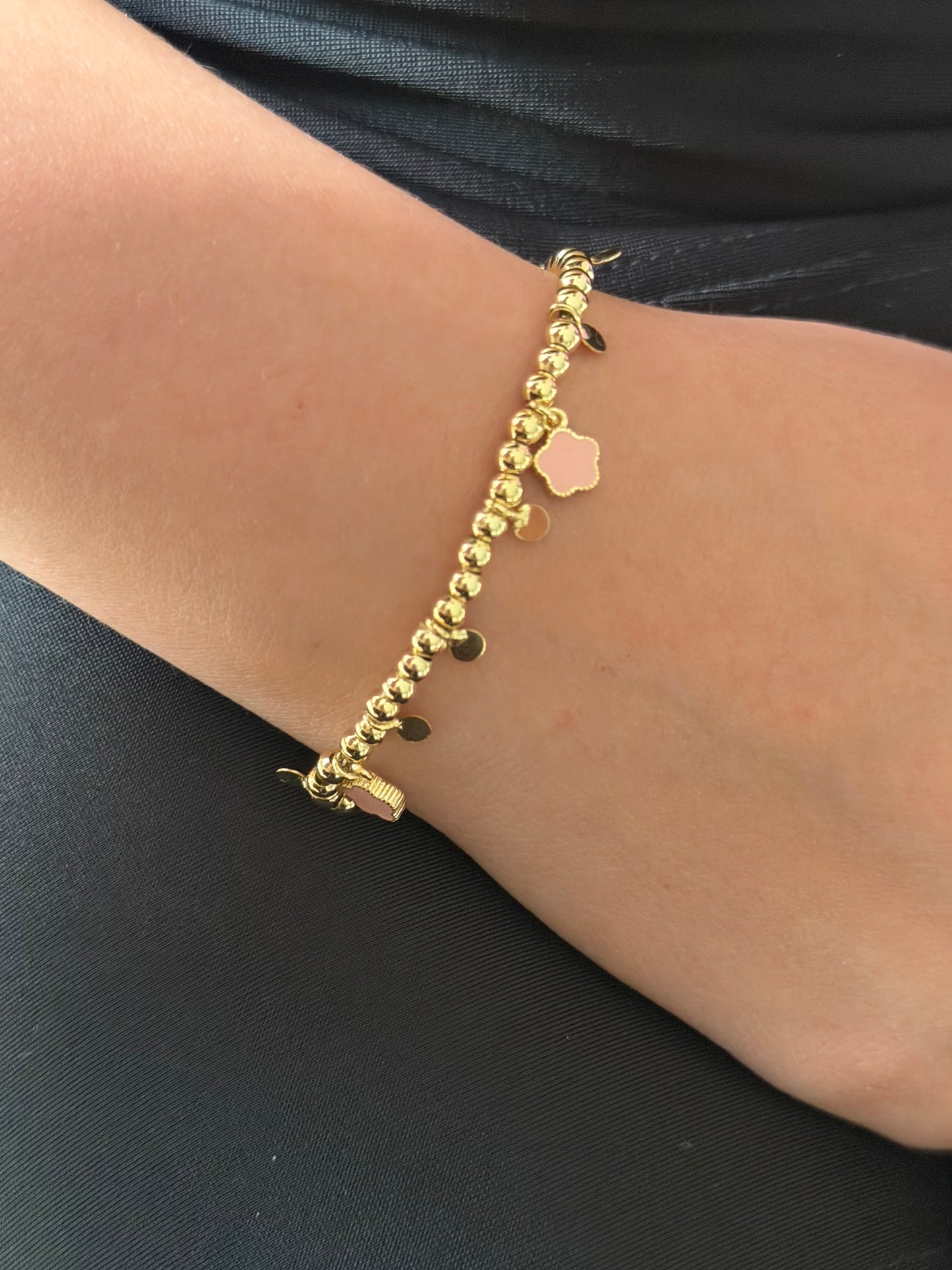 Pulsera bolitas y flores