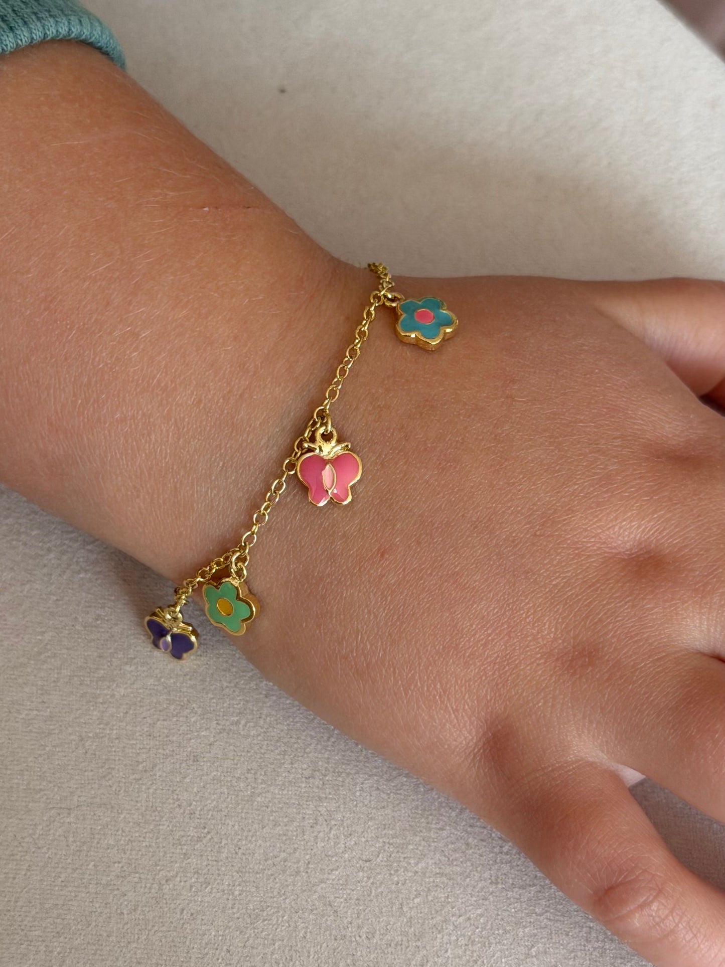 Pulsera flores y mariposas coloridas