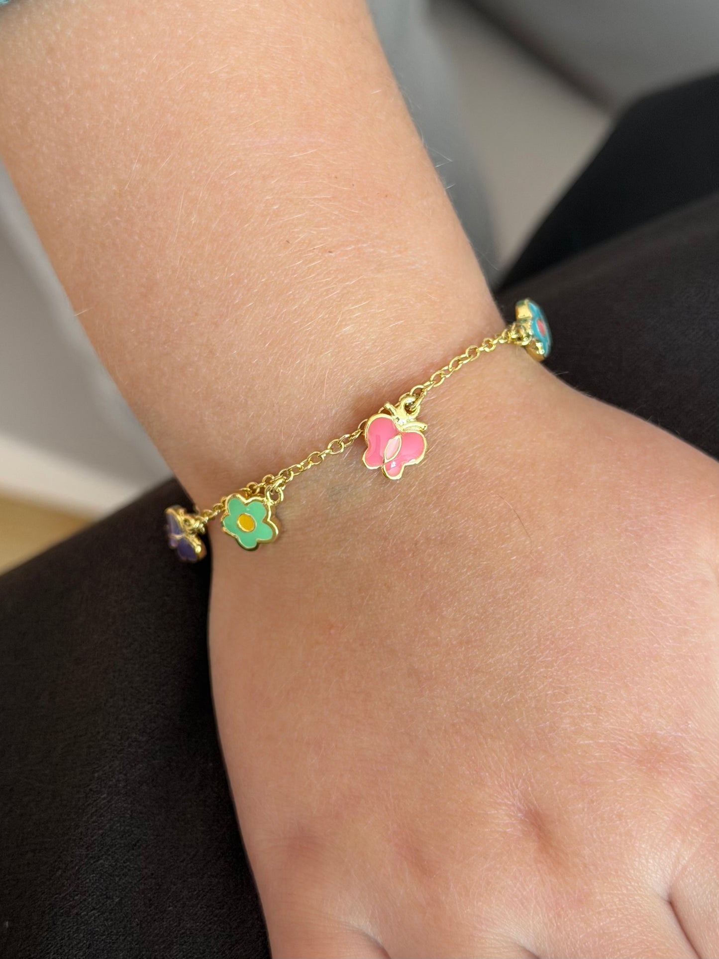 Pulsera flores y mariposas coloridas