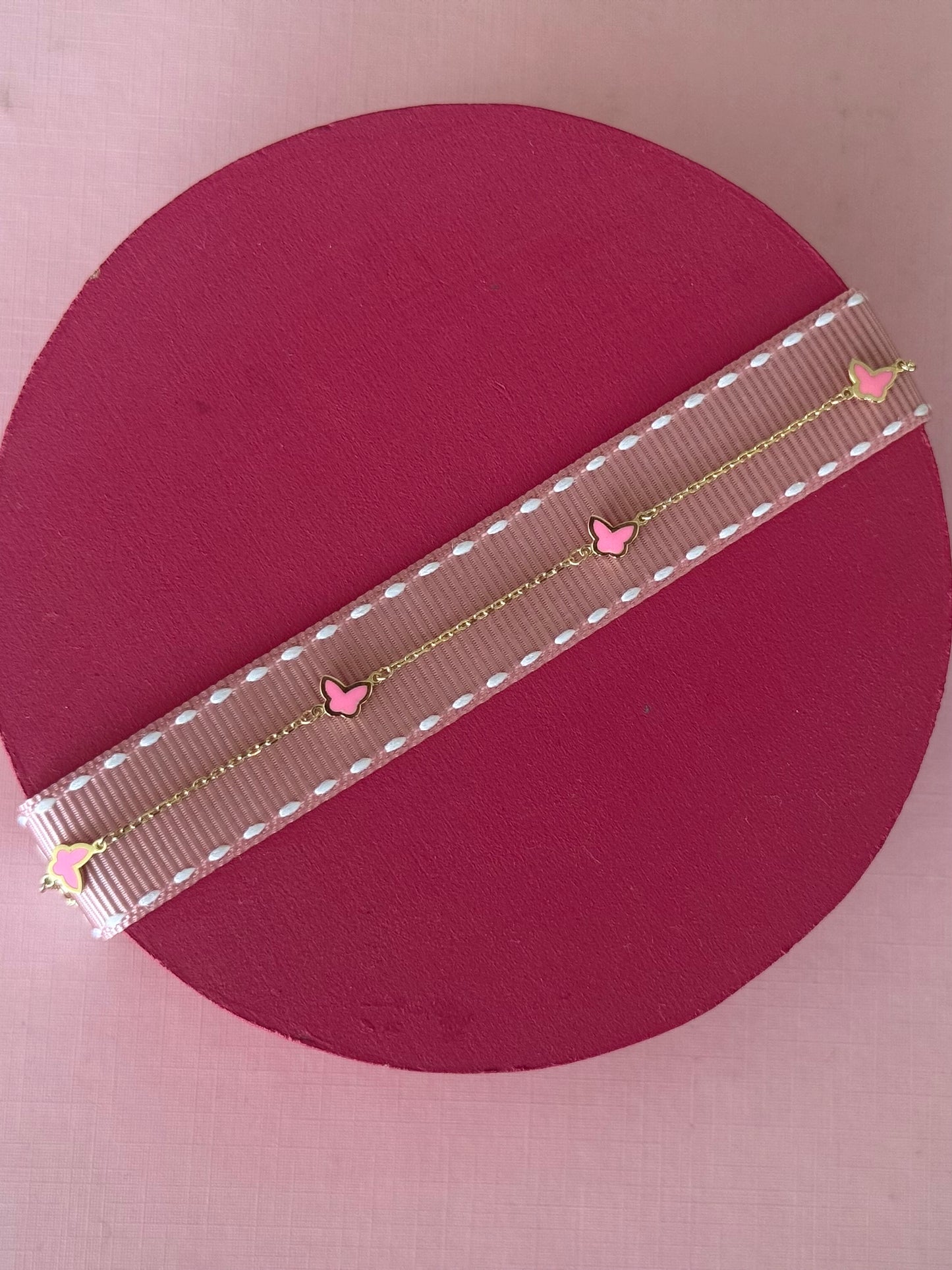Pulsera mariposas rosas