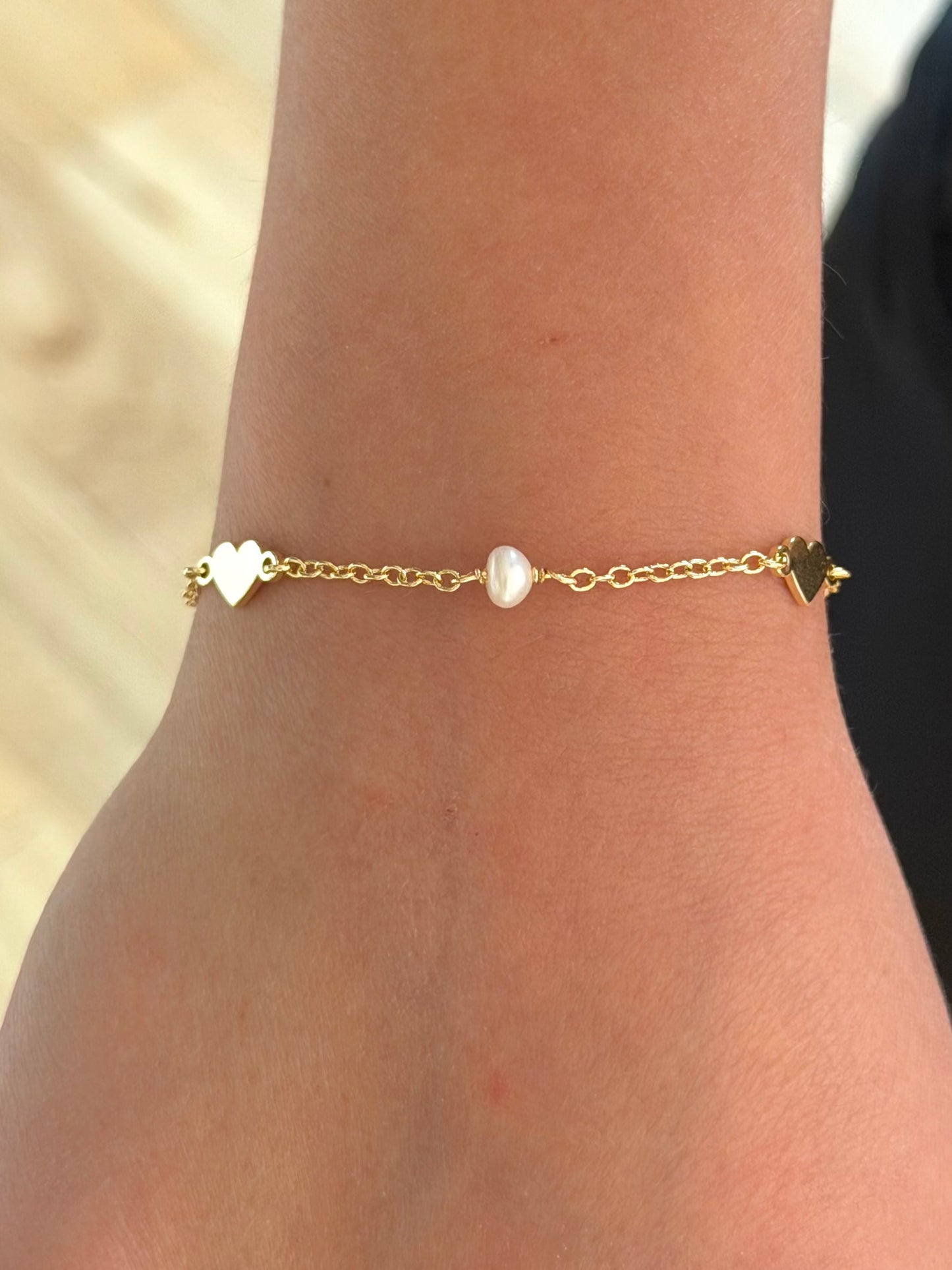Pulsera corazones y perlas