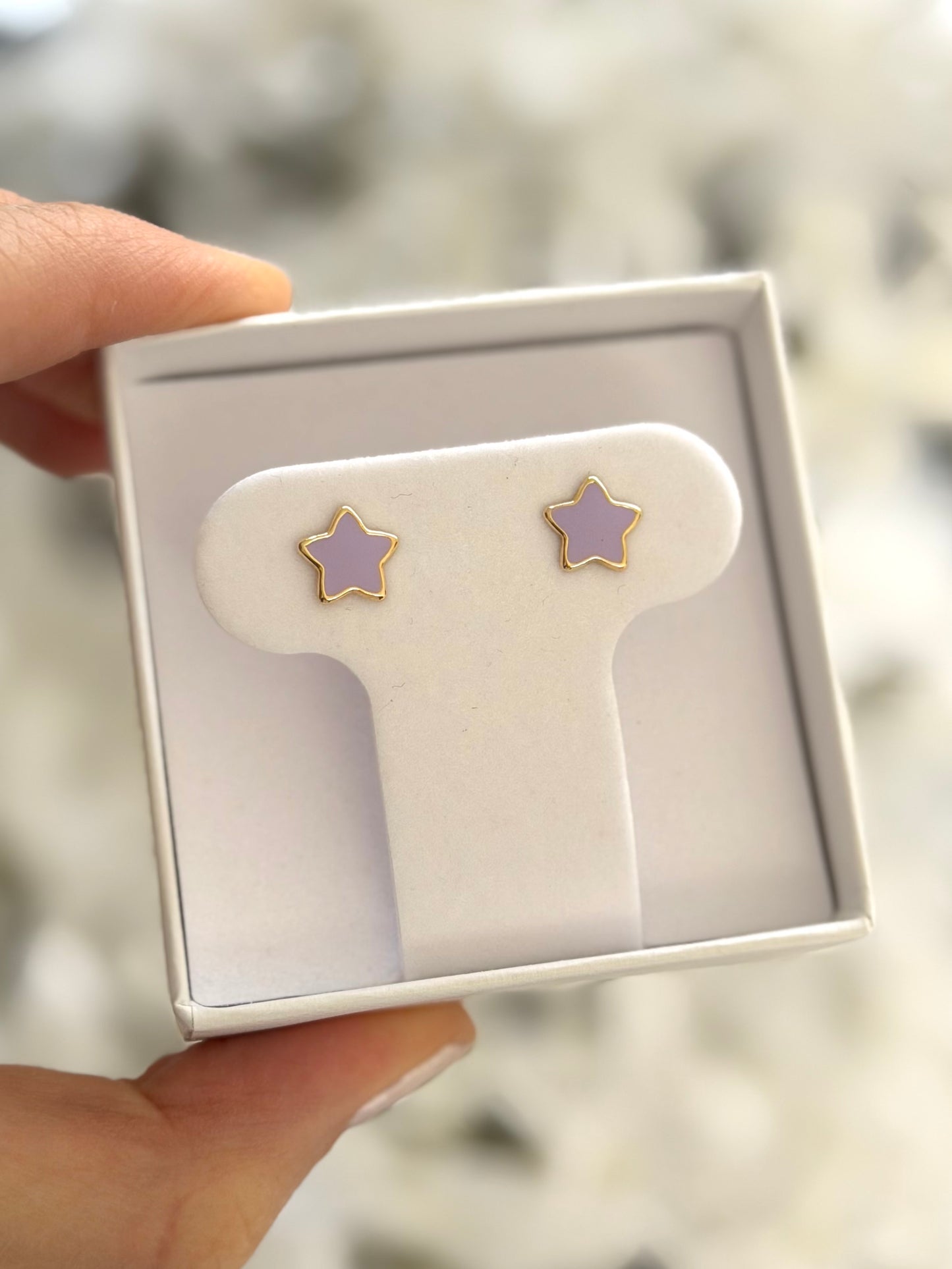 Aretes estrella morada