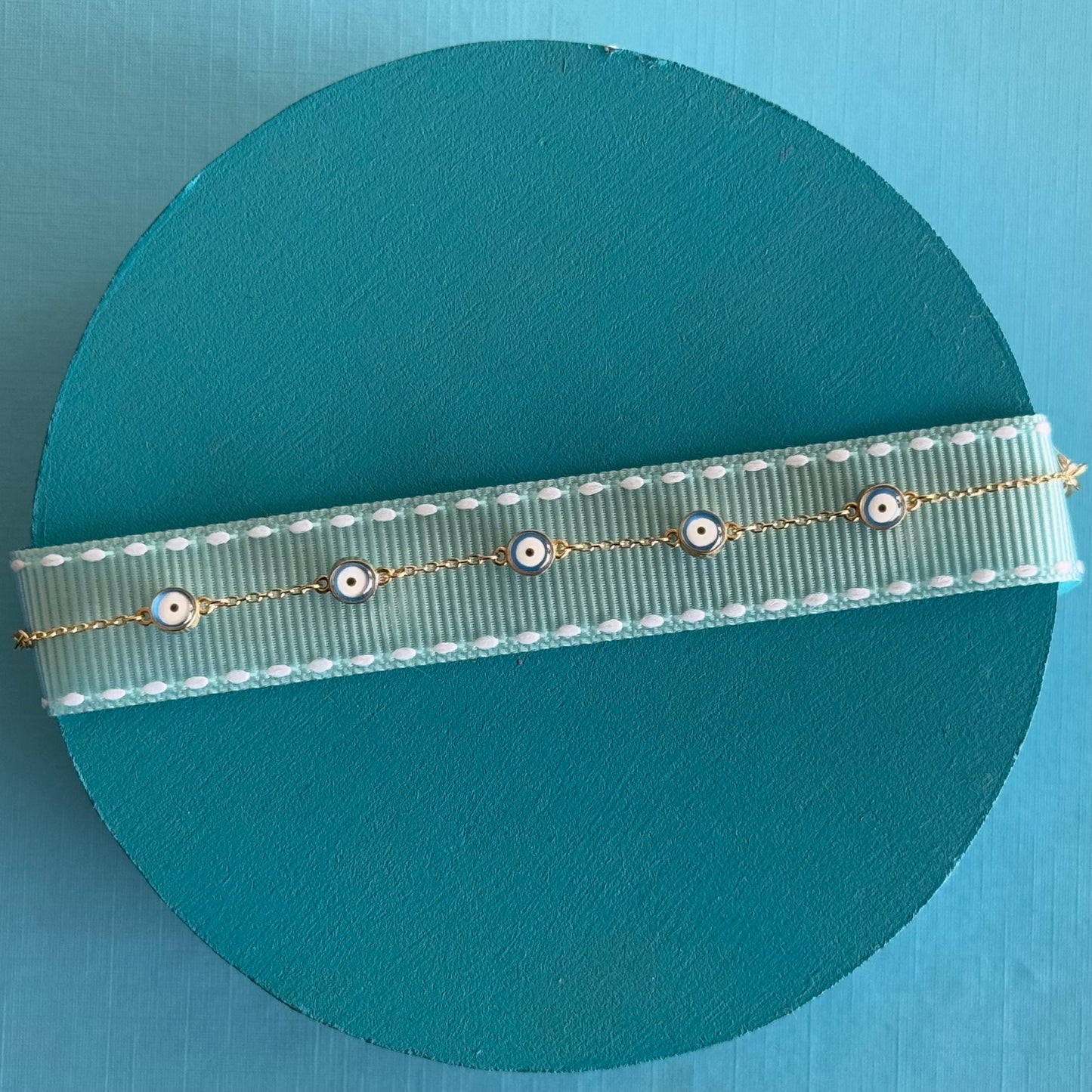 Pulsera ojitos